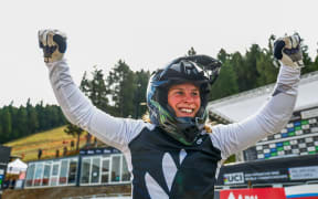 New Zealand mountainbiker Erice Van Leuven celebrates winning the Women Junior Downhill Final at the 2024 World Champs in Andorra.