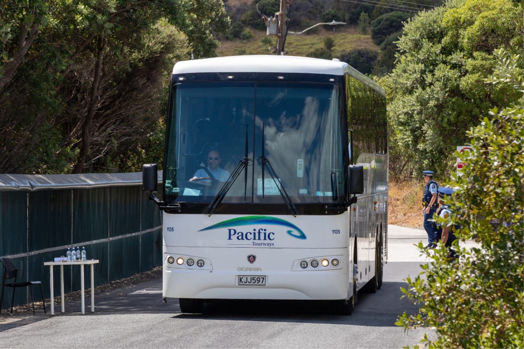 One of the buses used by evacuees leaving the quarantine zone at the Whangaparāoa base.