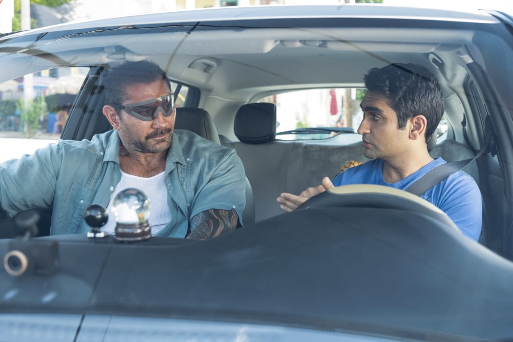 Dave Bautista as Vic and Kumail Nanjiani as Stu in Stuber.