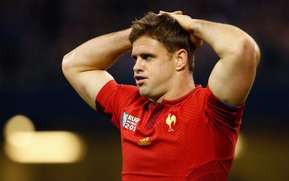 Rory Kockott of France is dejected after defeat in the 2015 Rugby World Cup Quarter Final match between New Zealand and France