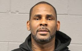 In this photo taken and released by the Chicago Police Dept., Friday, Feb. 22, 2019, R&B singer R. Kelly is photographed during booking at a police station in Chicago, Il. R. Kelly.