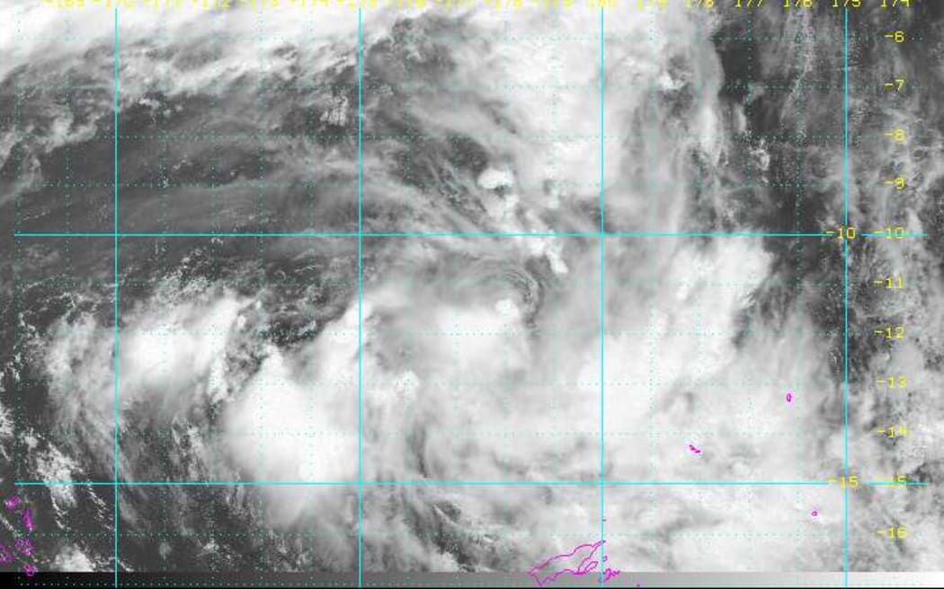 Cyclone Mona forms in the South Pacific on Thursday. It is forecast to intensify in the coming days and head south to Fiji (bottom pink outline).