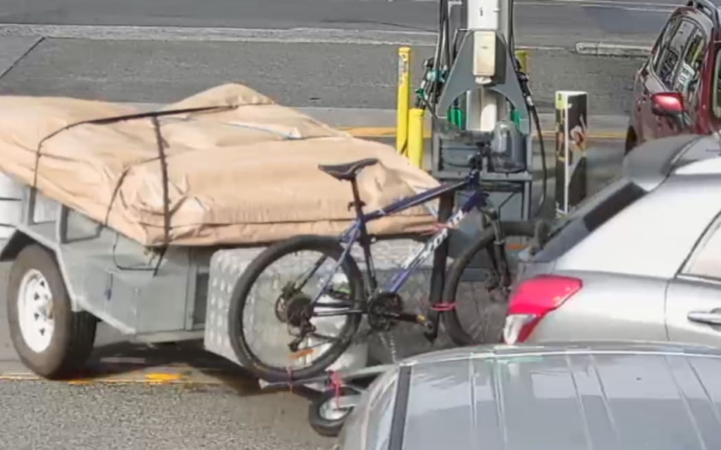 The vehicle of Tāngarākau homocide victim Adrian Humphreys' leaves BP Taumaranui service station on 6 May.
