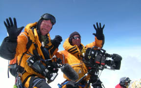 Climbers Dean Staples and Mark Woodward celebrating a joint fifth ascent of Mt Everest.