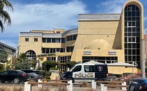 A police vehicle is parked in front of the hospital where survivors are treated, after a submarine carrying dozens of passengers sank off the resort town of Hurghada on Egypt's Red Sea coast, on March 27, 2025. Six Russian tourists, including two minors, died on March 27 when a submarine carrying dozens of passengers sank off the major resort town on Egypt's Red Sea coast. (Photo by AFP)
