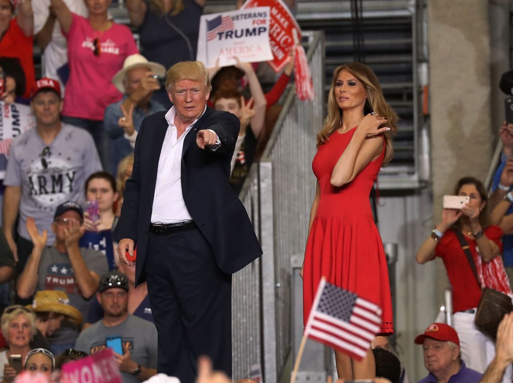 Donald Trump and Melania Trump during a campaign rally at Orlando Melbourne International Airport.