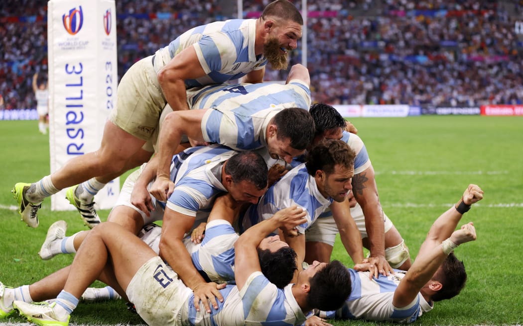 Nicolas Sanchez of Argentina celebrates with teammates after scoring the team's second try during the Rugby World Cup France 2023 Quarter Final match between Wales and Argentina at Stade Velodrome