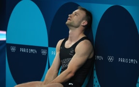 Dylan Schmidt after the final of the Paris Olympics trampoline gymnastics at Bercy Arena.