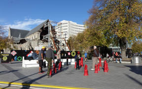 Christchurch's Cathedral Square is again busy with people enjoying a sunny Sunday afternoon, but five years on the cathedral still waits in disrepair.