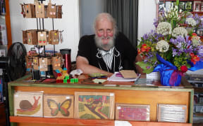 Louis “Puzzleman” Toorenburg in his natural environment, with some of his own puzzles.