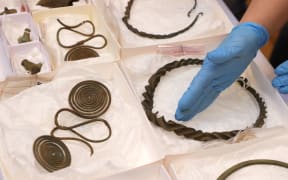 Necklaces, foot rings, chains and other objects from the Late Bronze Age which have been found in an archaeological survey south of Alingsås shown in Gothenburg, Sweden, on April 29, 2021.