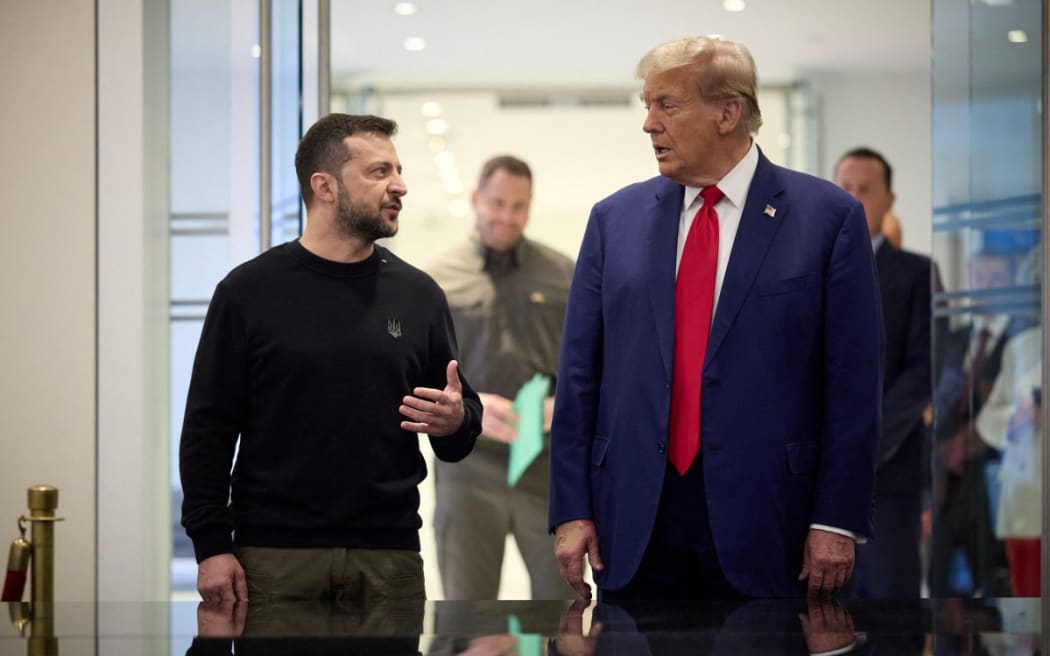 This handout photograph released by the Ukrainian presidential press service on September 27, 2024 shows Ukrainian President Volodymyr Zelensky (L) and Republican presidential nominee former US President Donald Trump meeting on September 27, 2024 in New York. - The meeting coincides with Zelensky's visit to New York for the United Nations General Assembly.