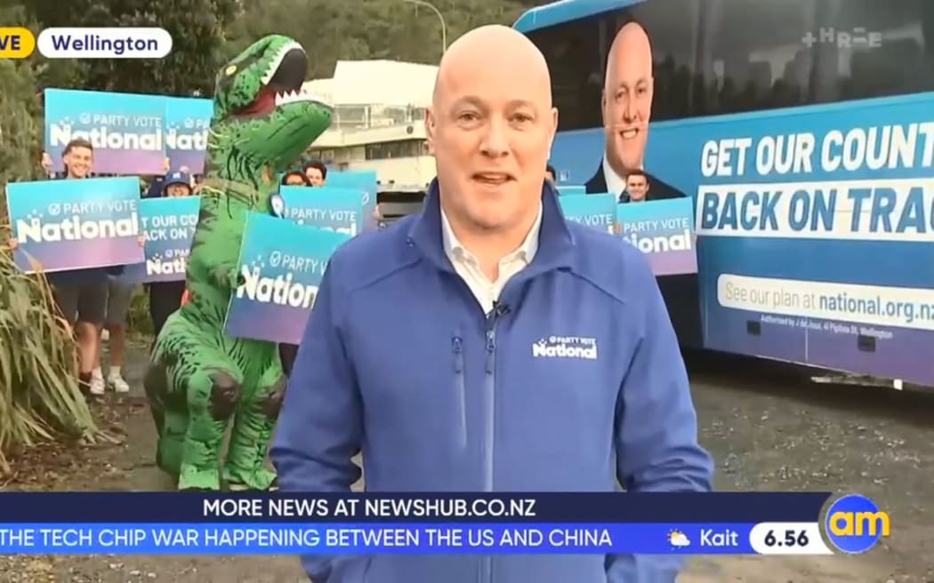 Christopher Luxon on the campaign trail with a velociraptor.