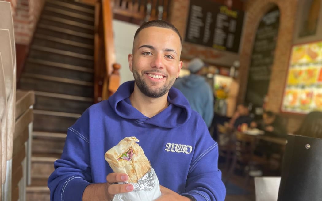 Zeeshan aka BigBoiBari with a mixed kebab from Celine Mediterranean Cuisine in Auckland CBD