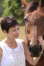 Photo of Johanna Emeney with horse