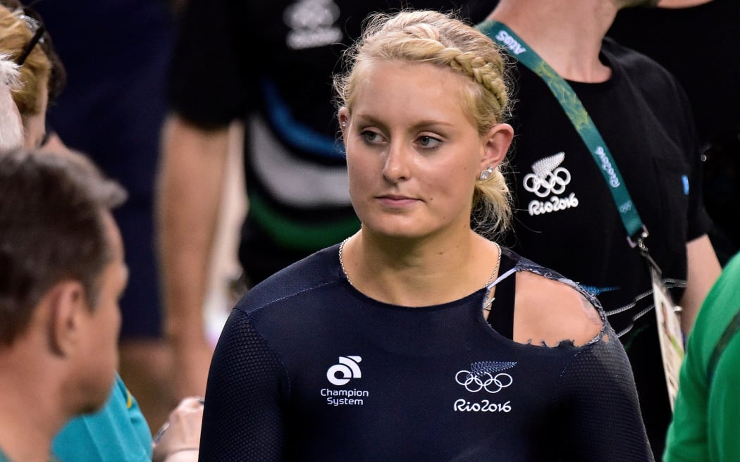 New Zealand's Olivia Podmore walks from the track after going down in a crash during the Women's Keirin round one track cycling race in Olympic Velodrome Stadium at the 2016 Rio Olympics on Saturday the 13th of August 2016. Podmore died suddenly in NZ in August 2021