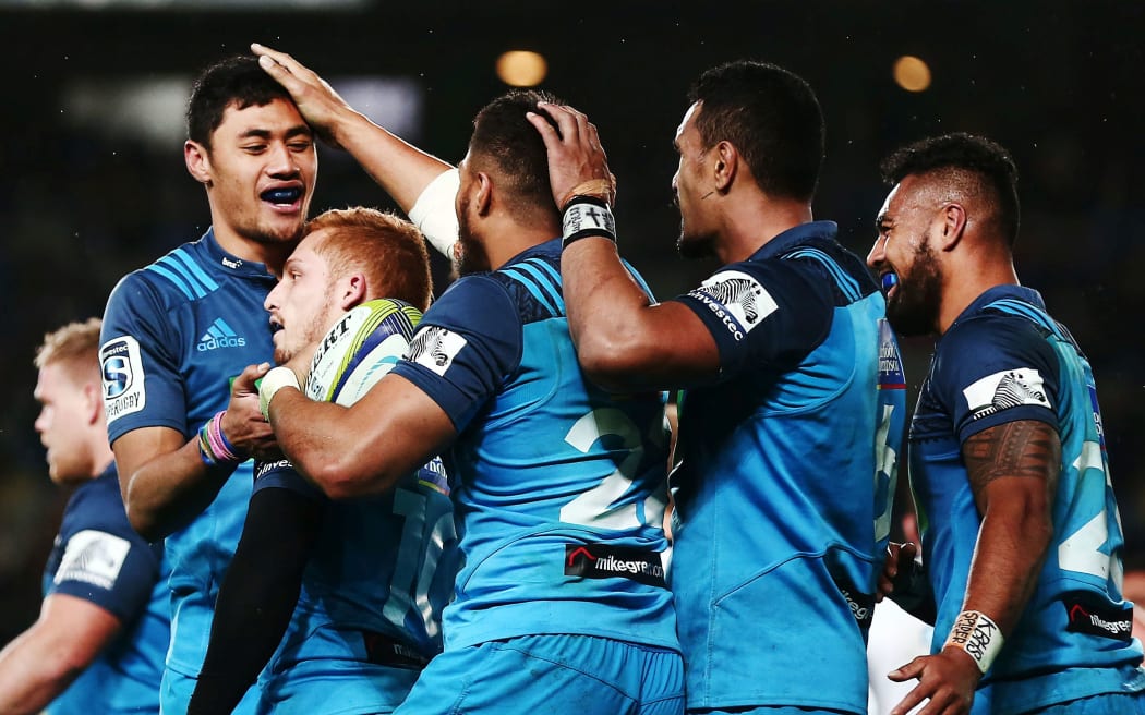 The Blues celebrate a try.
File