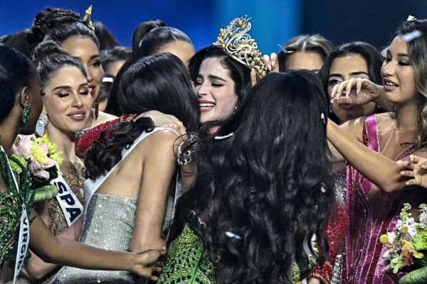 Miss Mexico Fatima Bosch (C) is surrounded by contestants as she celebrates winning the 2025 Miss Universe pageant in Nonthaburi, north of Bangkok, on November 21, 2025.