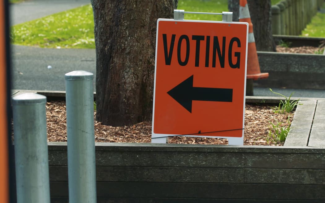 An orange voting sign.