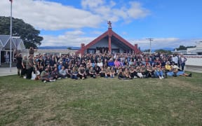 Attendees pose for a photo to launch Māoriland 2024.