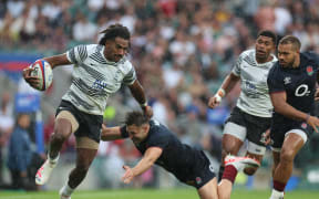 Selesitino Ravutaumada takes on and beats England's Jonny May at Twickenham, London on 26th August
 
 (Photo by Action Foto Sport/NurPhoto) (Photo by Action Foto Sport / NurPhoto / NurPhoto via AFP)