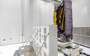 The James Webb Space Telescope stands in the S5 Payload Preparation Facility (EPCU-S5) at The Guiana Space Centre, Kourou, French Guiana at the end of last year.