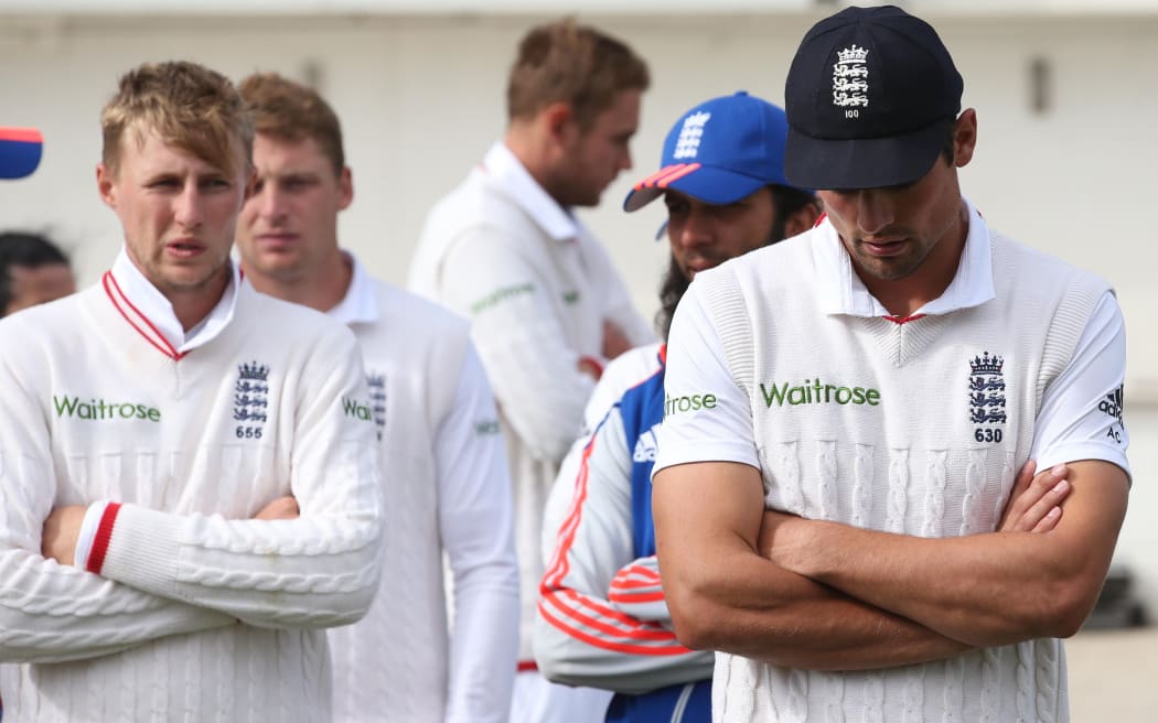 England cricket captain Alastair Cook (right) appears to have the weight of the world of on his shoulders at times.
