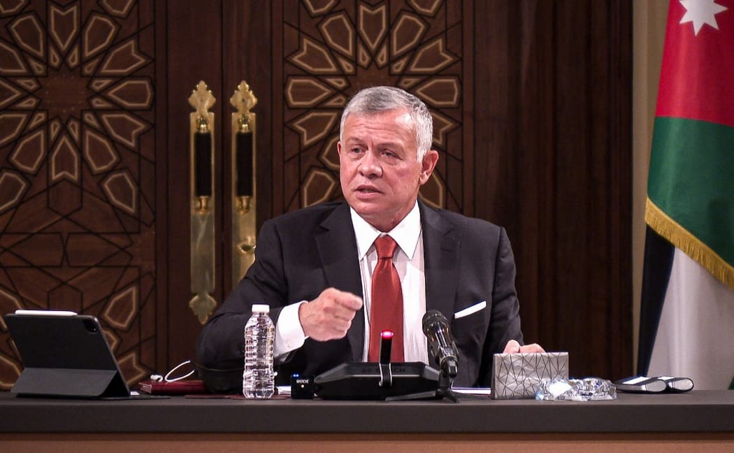 A handout picture released by the Jordanian Royal Palace on March 23, 2021 shows Jordanian King Abdullah II speaking during a meeting at the House of Representatives in the capital Amman. (