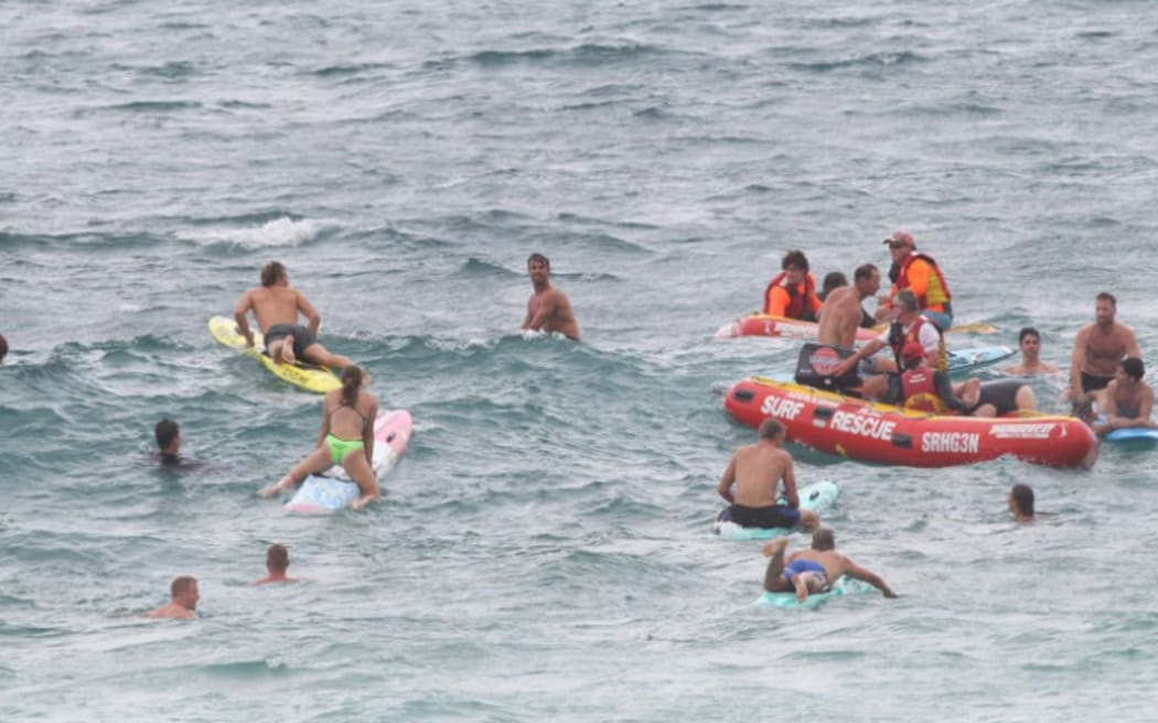 Nutri-Grain Ironmen and Ironwomen swung into action post competition to save a group of 25 swimmers at Maroubra beach who were caught in a rip.