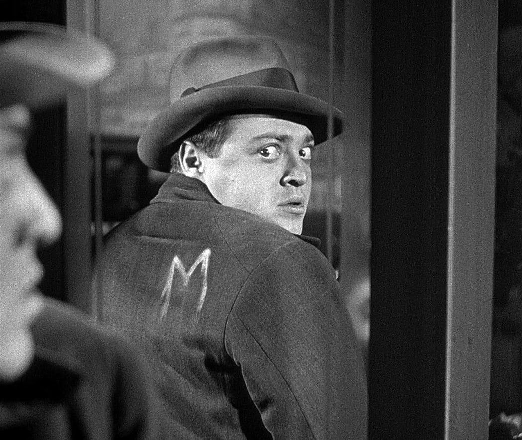Film still from Fritz Lang's 1931 thriller M featuring Peter Lorre as the child murderer