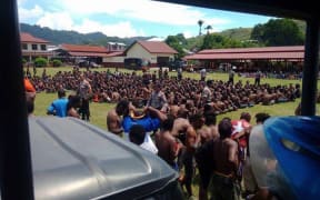 Indonesian security forces hold demonstrators