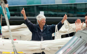 Former Green party leader Jeanette Fitzsimons, aboard SV Vega, responds to the crowd gathered at Princes Wharf to welcome the Oil Free Seas Flotilla back to Auckland in 2013.