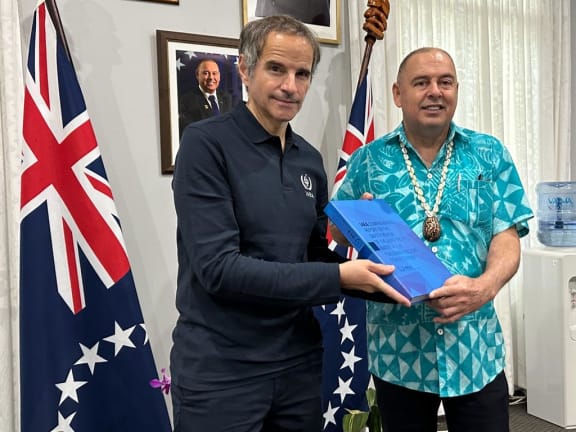 IAEA Director General Rafael Grossi delivers report on Japan's ALPS-treated wastewater plans to the Pacific Islands Forum chair, Cook Islands Prime Minister Mark Brown in Rarotonga.