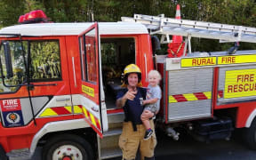 Tributes flowed for Craig Stevens at a service at Parihoa Farm in Muriwai on 1 March 2023. The 39-year-old died three days after being critically injured after a house collapsed while he was attending a major slip callout on 13 February.