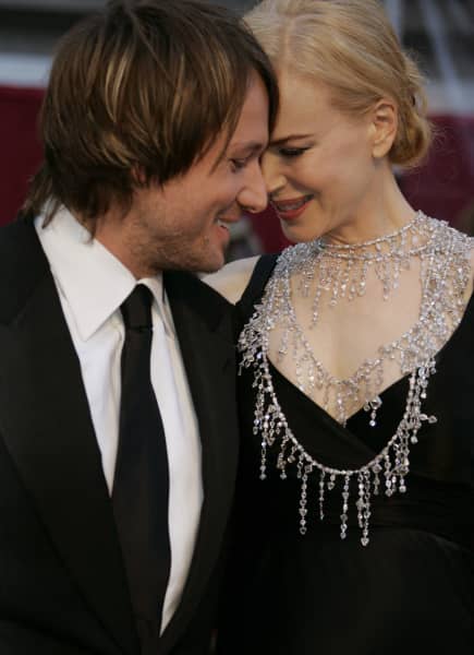 (FILES)Nicole Kidman (R) and Keith Urban (L) arrive for the 80th Annual Academy Awards at the Kodak Theater in Hollywood, California in this February 24, 2008 file photo. Australian film star Nicole Kidman and husband country music singer Keith Urban welcomed a baby girl on July 7, 2008, calling her Sunday Rose. "Nicole and Keith Urban are delighted to announce that Nicole Kidman gave birth to a baby girl on Monday morning, July 7, 2008 in the United States," her agent, Allen Eichhorn, said in a statement. "Sunday Rose Kidman Urban weighed six pounds, seven and a half ounces (2.9 kilograms). Husband Keith was by Nicole's side and mother and baby are very well," he said. AFP PHOTO / STAN HONDA (Photo by STAN HONDA / AFP)