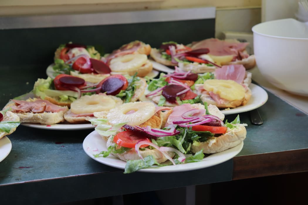 Burgers galore for the homeless in Napier as part of lunch at the outreach centre, which is provided three days a week and run by Whatever it Takes.