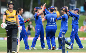 The Auckland Hearts celebrate taking the wicket of Maddy Green in the Super Smash Twenty20 cricket match against the Wellington Blaze at Eden Park Outer Oval. Sunday 7 February 2021.