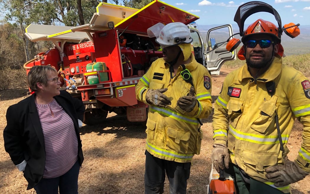 Tracey Martin with firefighters in Australia