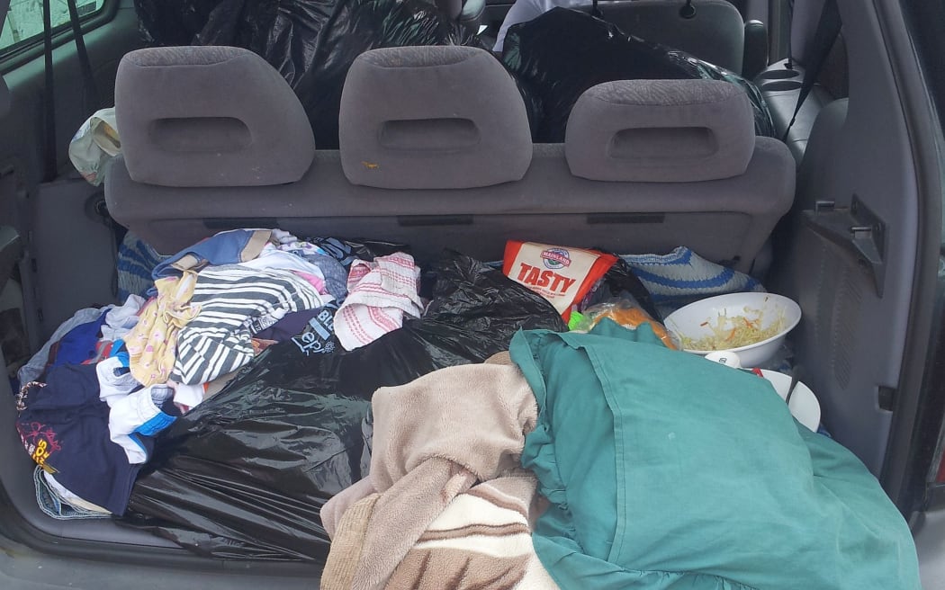 The boot is full of bedding and some food