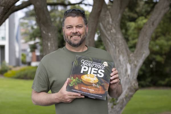 Author and photographer Derek Morrison with his latest book, New Zealand's Best Gourmet Pies