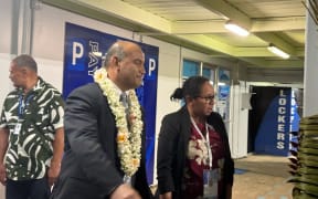 Nauru President David Adeang, left, arrives in Rarotonga for the 52nd Pacific Islands Forum Leaders Meeting in the Cook Islands. 5 November 2023.
