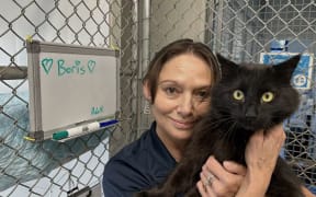 Boris and SPCA Nelson staff member Carmen Torrance. Boris was the last animal to be returned after a burglary of the premises in February when animals were set free.