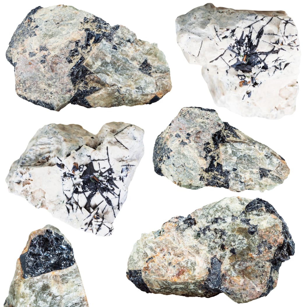 set of ilmenite ore on natural mineral stones and rocks (nepheline, dolomite) isolated on white background