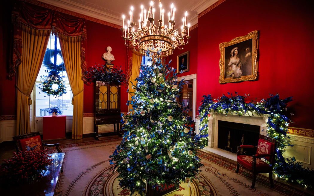 Christmas decorations are seen in the Red Room of the White House on Monday, 1 December 2025.