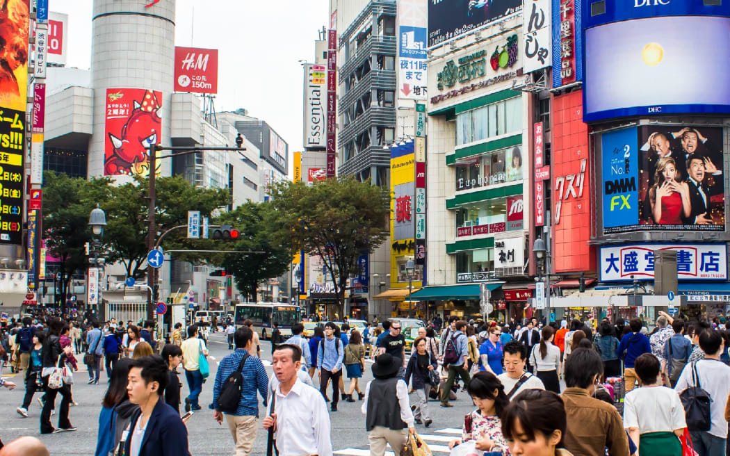 Shibuya Crossing, one of the world's most used pedestrian scrambles, at Hachiko Square in Shibuya, Tokyo.