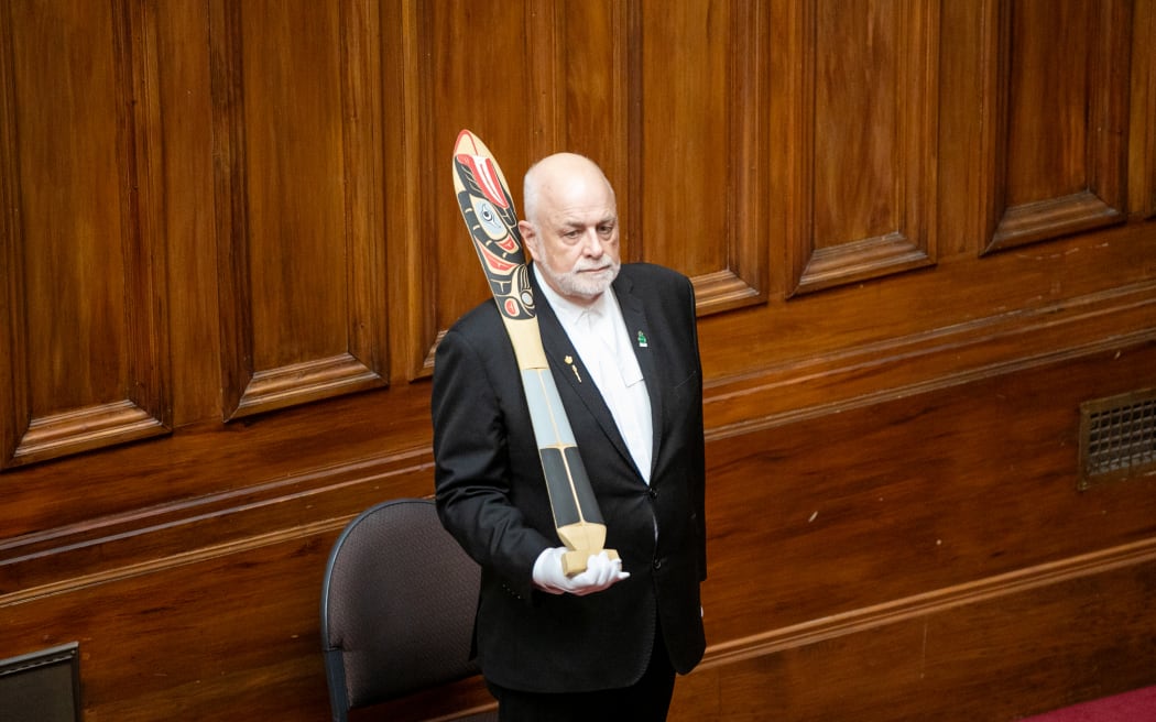 Serjeant-at-Arms Steve Streefkerk holds the CYP mace during the Opening of the Parliament