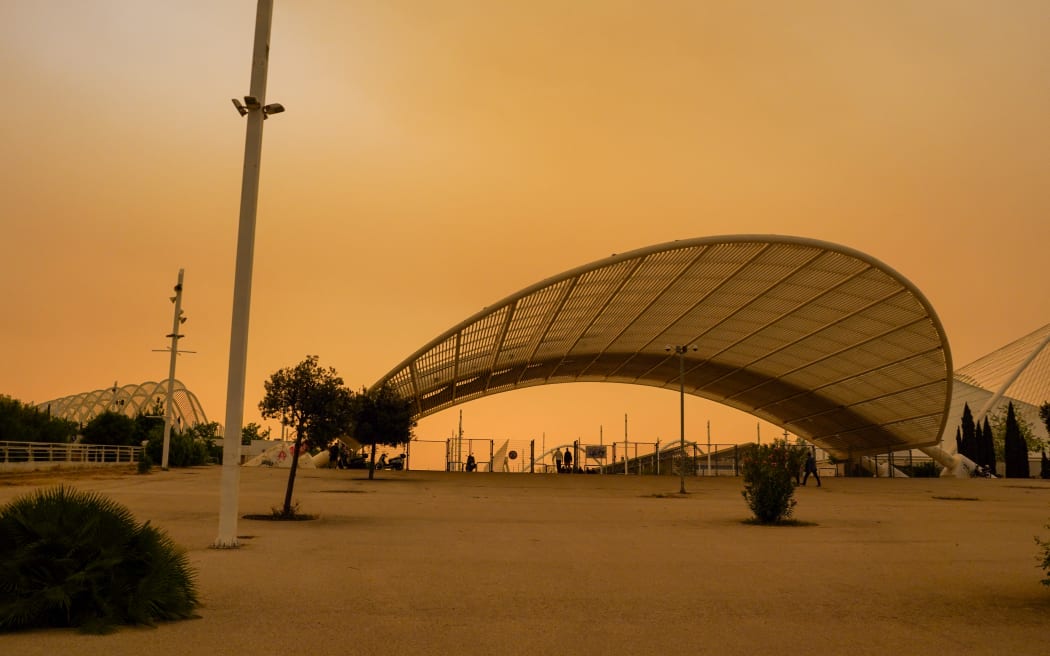 The sky is covered in dust from the Sahara as seen from the premises of the Olympic Stadium in Athens, Greece, on April 23, 2024. (Photo by Giorgos Arapekos/NurPhoto) (Photo by Giorgos Arapekos / NurPhoto / NurPhoto via AFP)