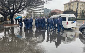 Police gather at the entrance to parliament grounds after streets surrounding parliament were closed off on Wednesday 27 September 2023.