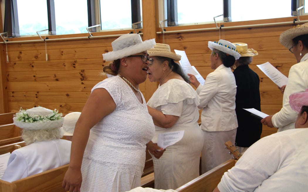 Members of the congregation, Cook Islands Christian Church, Porirua, sing traditional hymns