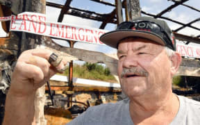 Dunedin resident Gary West was reunited with rings given to him by his late wife when they were retrieved by a fire investigator after his house bus was destroyed in a fire at the weekend.